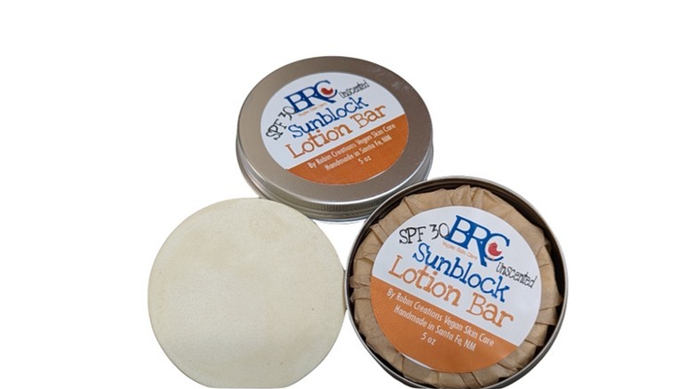 sunblock lotion bar in tin