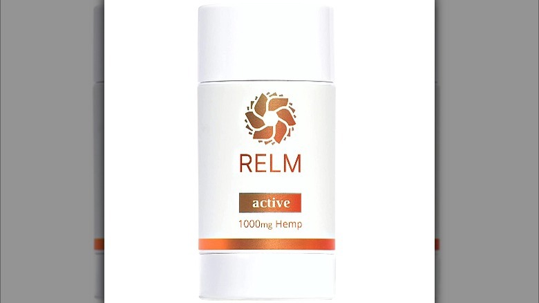 white and orange lotion stick