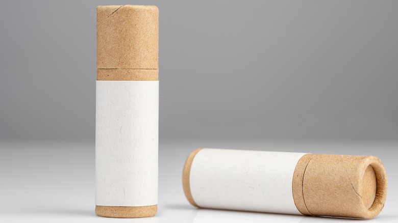 two balms in cardboard packaging