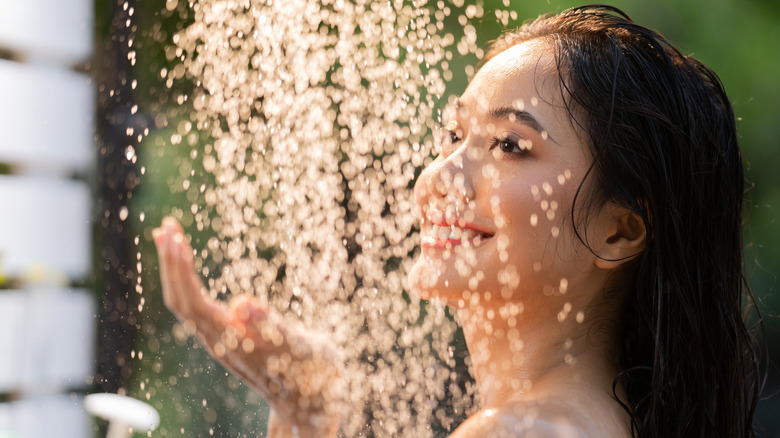 Person showering outdoors 