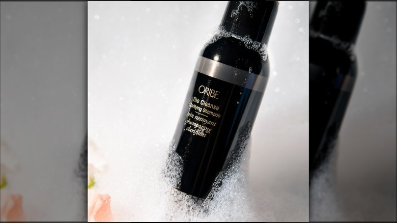 Soapy bottle of shampoo