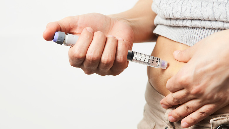 Person receiving an insulin shot