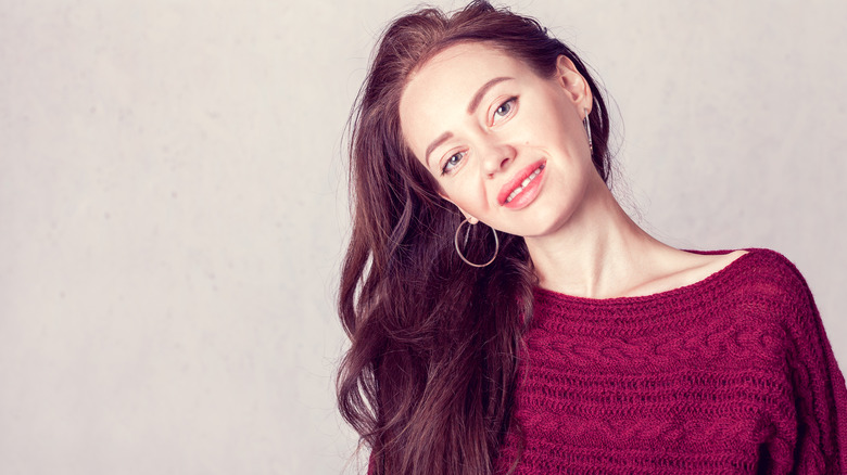 woman with long burgundy hair
