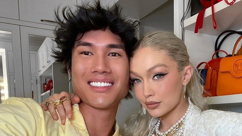 Patrick Ta posing with Gigi Hadid