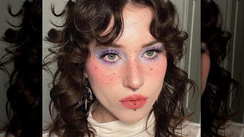 Woman with blue eye shadow