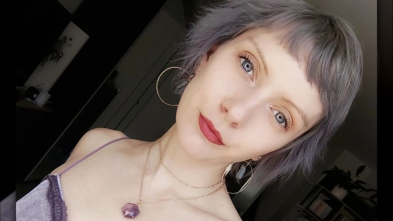 A woman with micro bangs