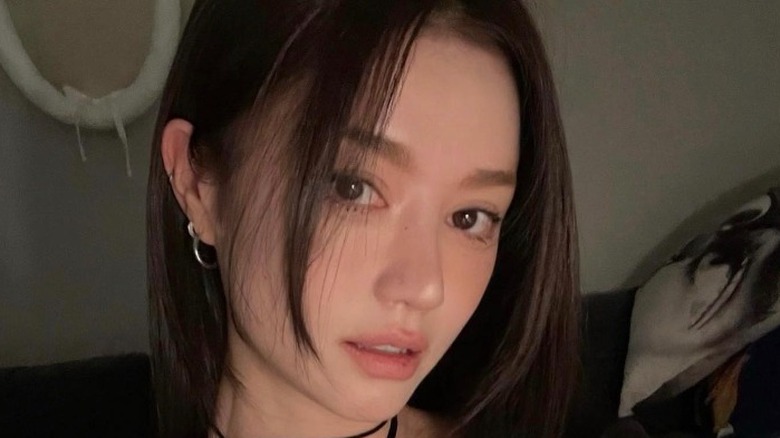 A woman with curve bangs