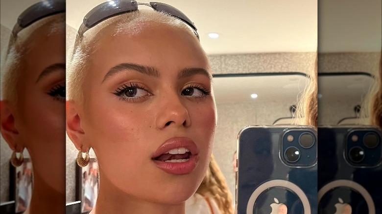 A woman with a buzzcut