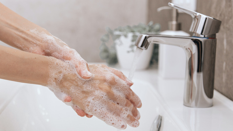 woman washing hands