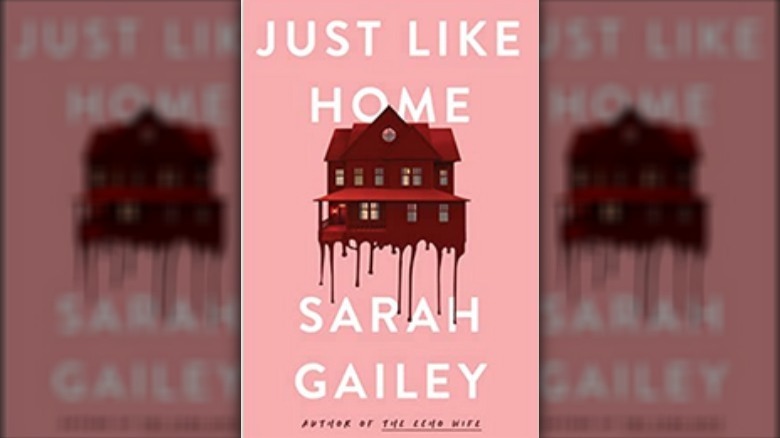 Red house on a pink background