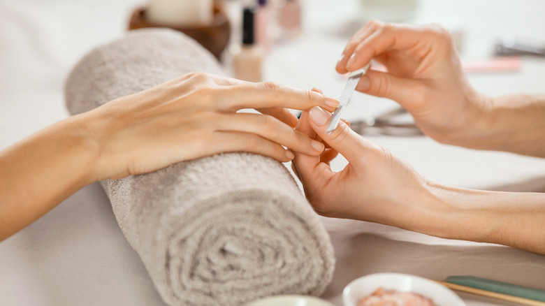 woman getting a manicure