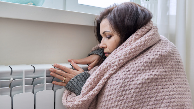 woman trying to get warm