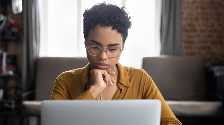 Woman researching on her laptop