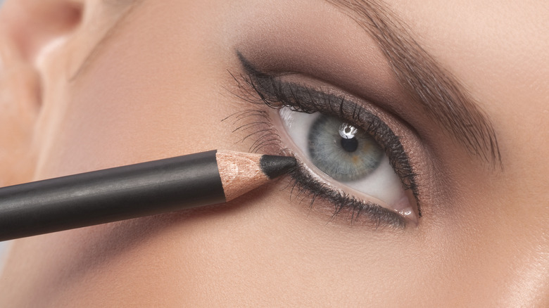 eyeliner pencil on eye