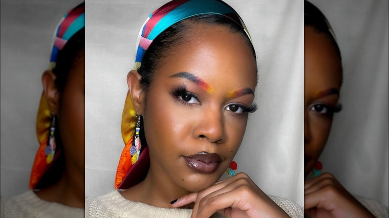 woman with colorful brows