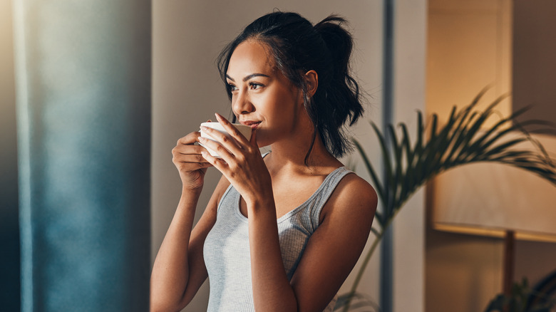 woman drinking coffee