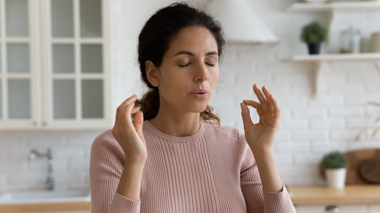 woman deep breathing