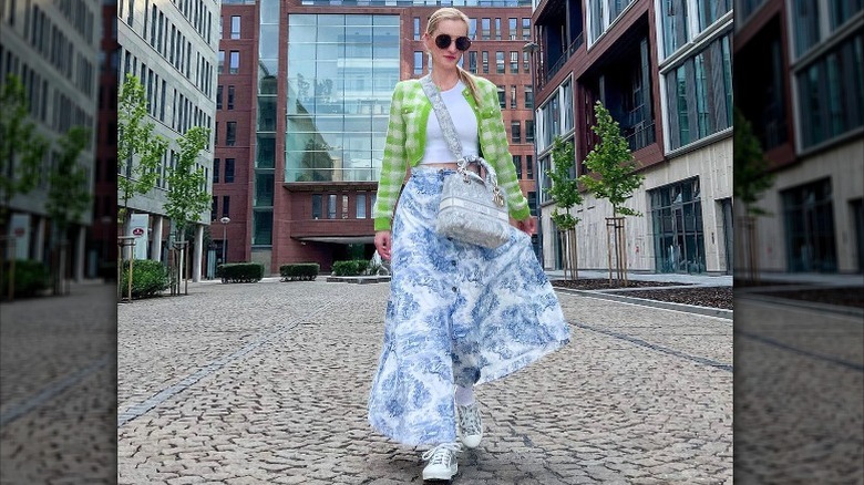 Woman mixing patterns, colors