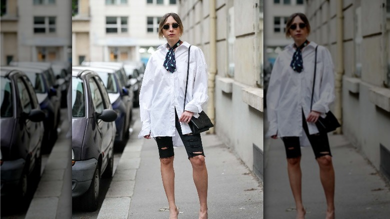 Woman in white blouse walking