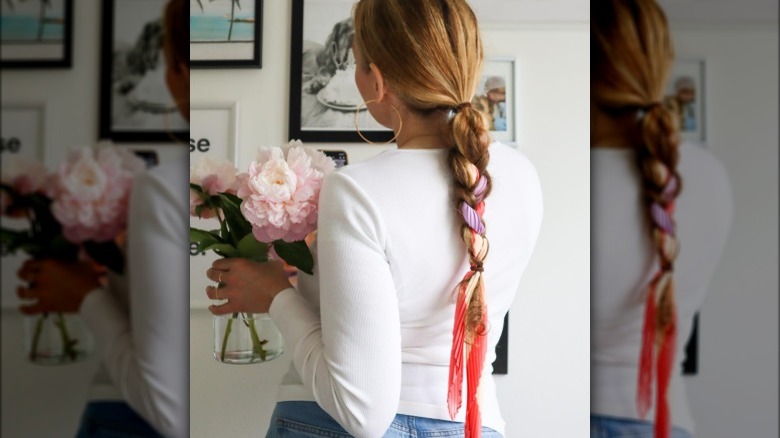 Woman with scarf in braid