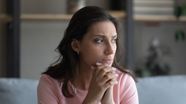 woman looking anxious