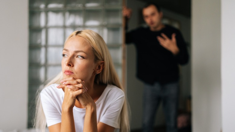 couple fighting in bed