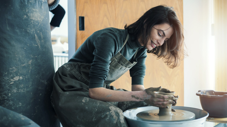 Woman enjoying pottery hobby
