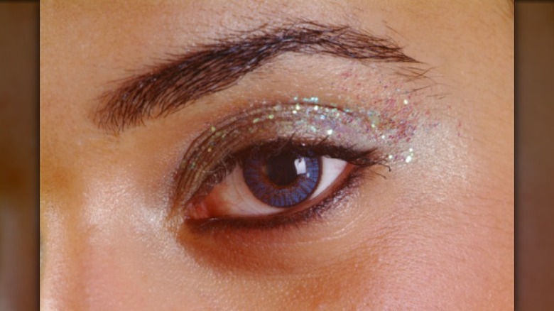 Person with glittery eyeshadow