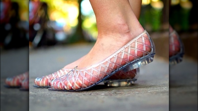 woman in clear sandals