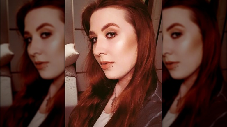 woman with spider bite lip piercing