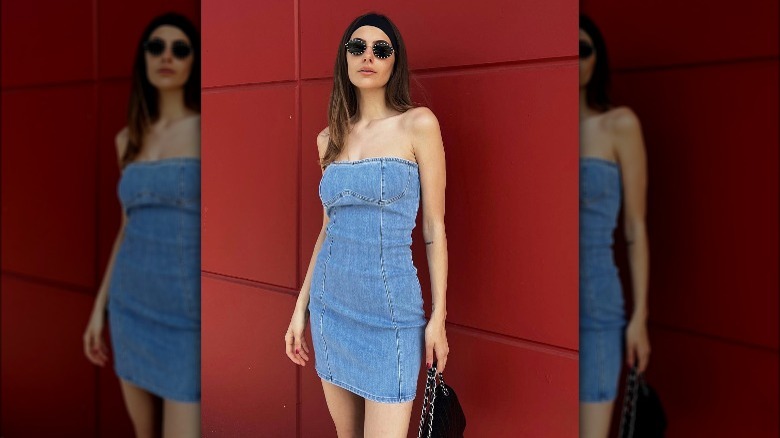 Woman wearing strapless denim dress