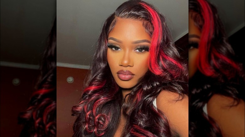 woman with side part in hair