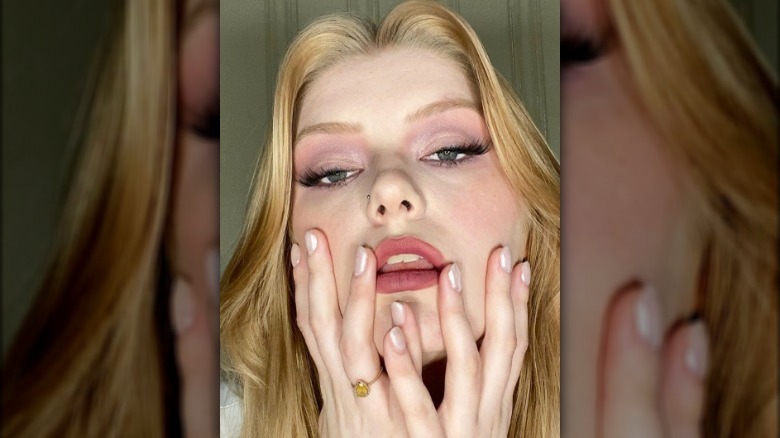 woman wearing pink makeup