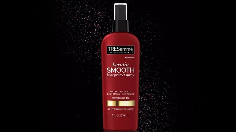 Tresemme bottle on black background