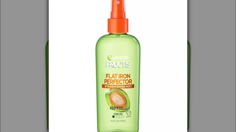 Green bottle of straightening mist