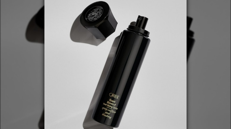 Uncapped black haircare bottle 
