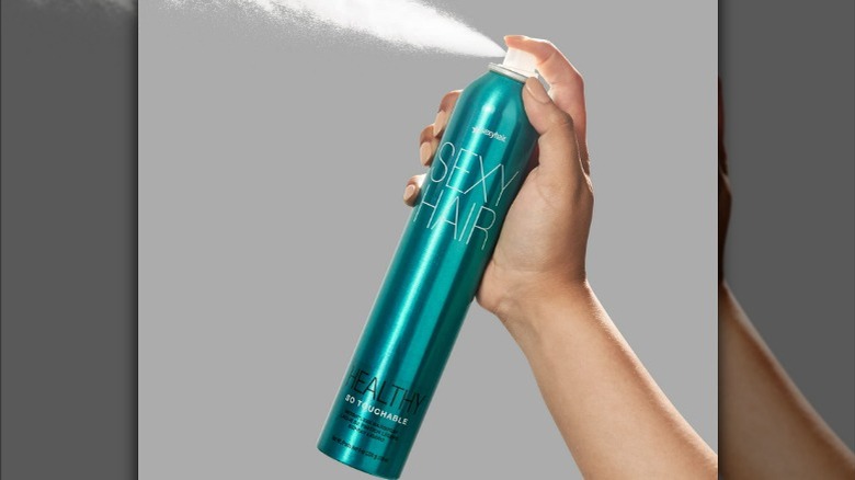 Blue bottle of hairspray