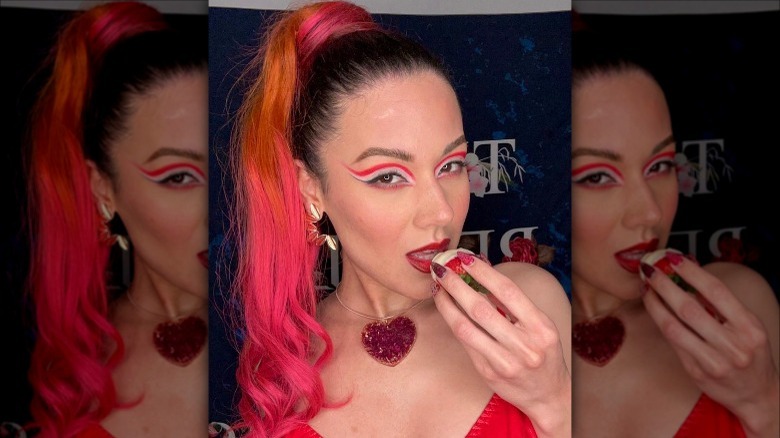 Woman with cut crease red eyeliner