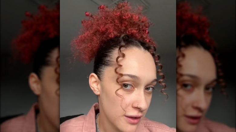 Woman with red curly hair