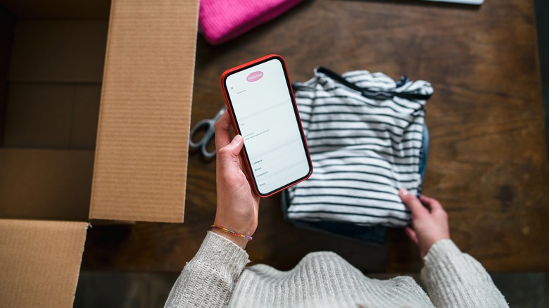 woman selling her clothes online