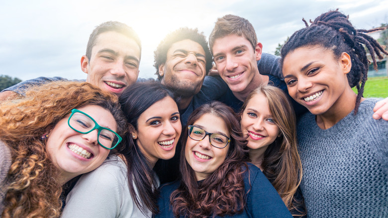 group of happy adult friends