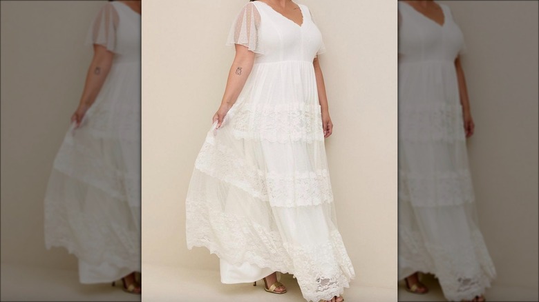 bride in Torrid dress