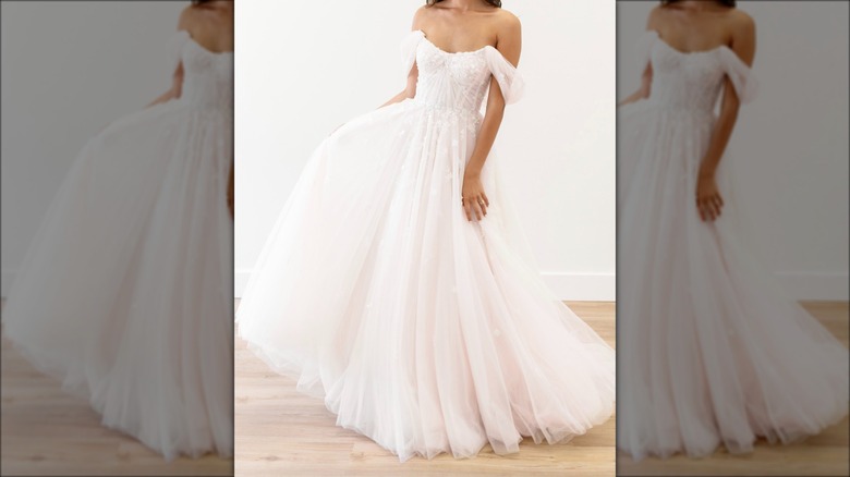 bride in Watters Designs dress