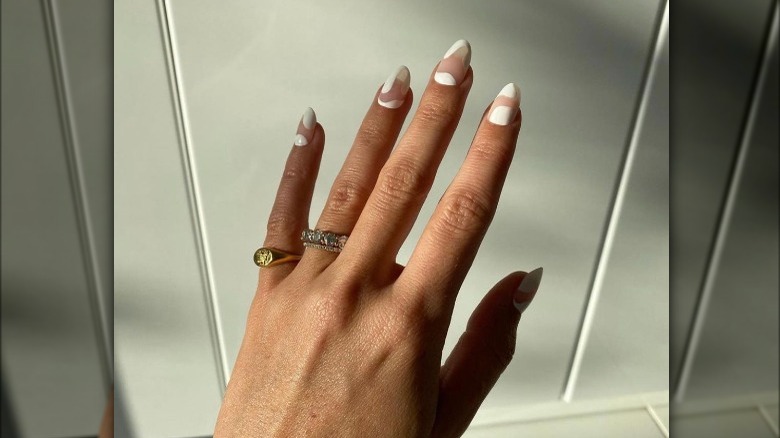 white abstract swirl manicure