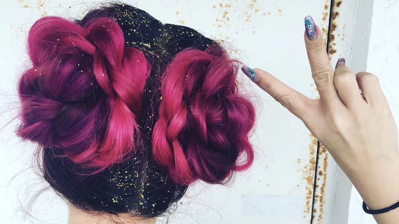 A woman with glitter in her hair