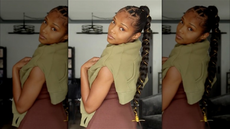 A woman with wire around her braid