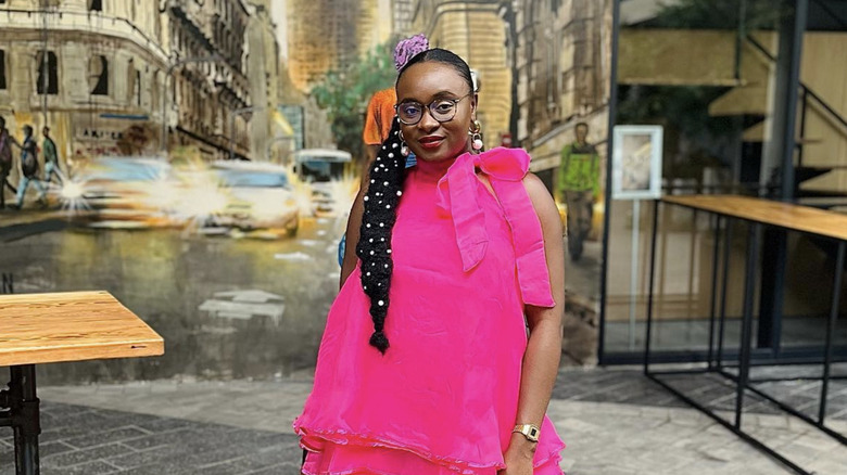 A woman with pearls in her braid