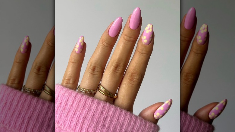Pink nails with tropical flowers