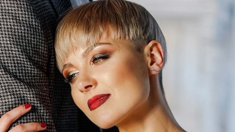 Blond woman short pixie cut