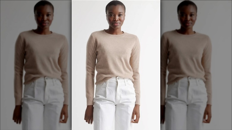 Model wearing Quince sweater